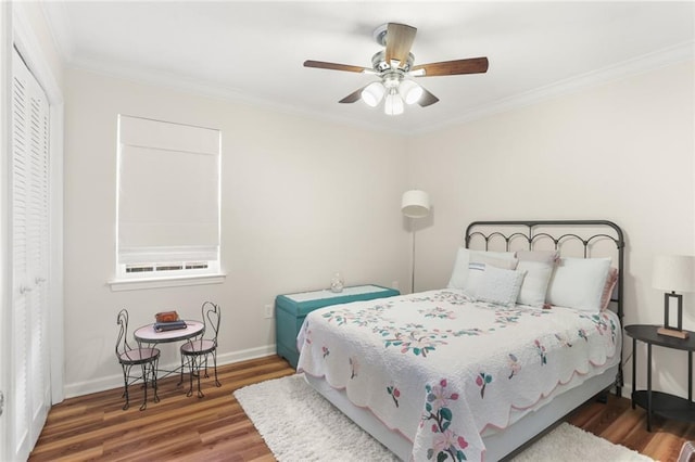 1113 Linwood Ave, Metairie, LA 70003 - bedroom with wood finished floors, baseboards, ornamental molding, and ceiling fan