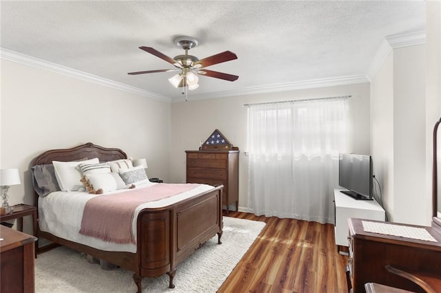 1113 Linwood Ave, Metairie, LA 70003 - bedroom with crown molding, light wood-style floors, ceiling fan, and a textured ceiling