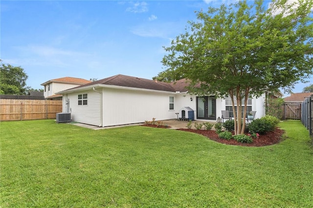 1113 Linwood Ave, Metairie, LA 70003 - back of property with a patio, central AC, and french doors