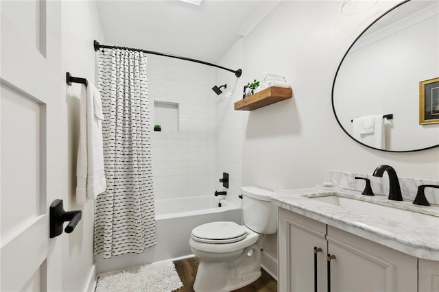 502 Audubon Trce Unit 502, Jefferson, LA 70121 - full bathroom featuring wood finished floors, vanity, shower / bath combo, and toilet