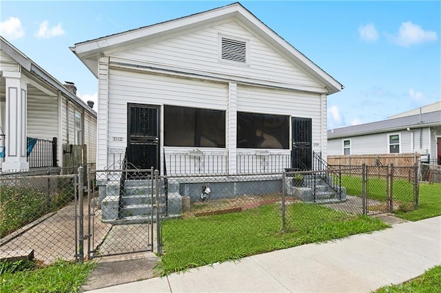 3114 Audubon St, New Orleans, LA 70125 - shotgun-style home with a gate and covered porch