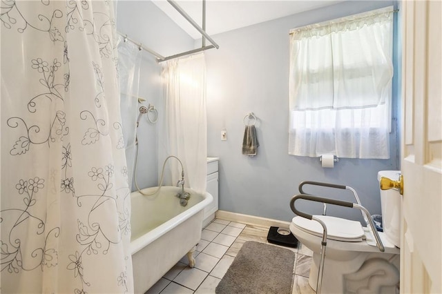 3114 Audubon St, New Orleans, LA 70125 - full bathroom with shower / bath combo with shower curtain, toilet, tile patterned flooring, and baseboards