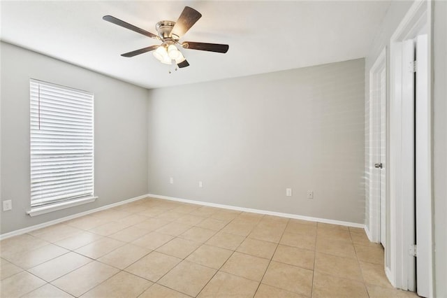 303 Parkview Blvd Unit 303, Mandeville, LA 70471 - unfurnished room featuring ceiling fan, light tile patterned flooring, and baseboards