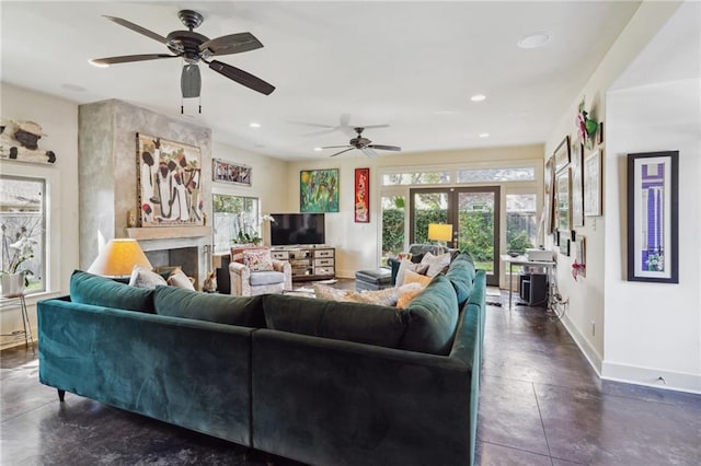 1141 Allen Toussaint Blvd, New Orleans, LA 70124 - living area featuring baseboards, recessed lighting, a ceiling fan, and finished concrete flooring
