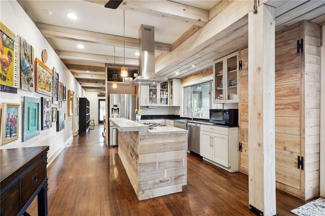1141 Allen Toussaint Blvd, New Orleans, LA 70124 - kitchen with appliances with stainless steel finishes, island range hood, dark wood-style flooring, a center island, and glass insert cabinets