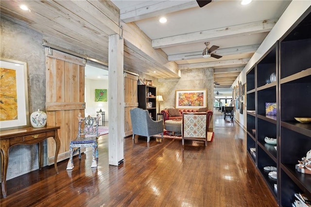 1141 Allen Toussaint Blvd, New Orleans, LA 70124 - living area with a ceiling fan, beamed ceiling, hardwood / wood-style flooring, and a barn door