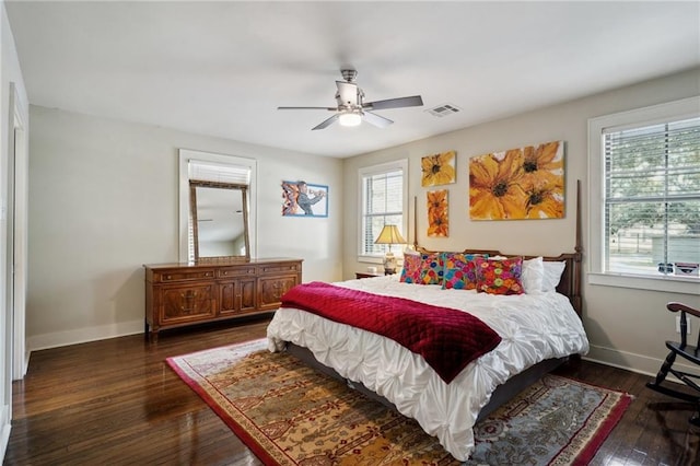 1141 Allen Toussaint Blvd, New Orleans, LA 70124 - bedroom with baseboards, dark wood-style flooring, and ceiling fan
