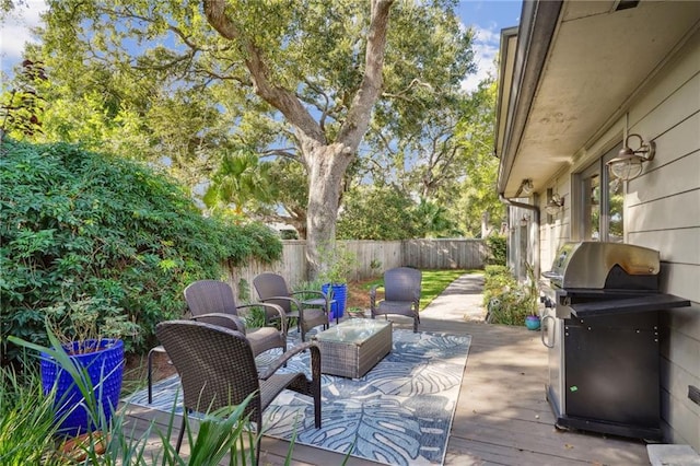 1141 Allen Toussaint Blvd, New Orleans, LA 70124 - wooden terrace with a fenced backyard and a grill