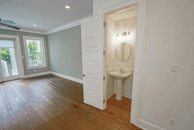 433 S Cortez St, New Orleans, LA 70119 - empty room with baseboards, a ceiling fan, wood finished floors, ornamental molding, and recessed lighting