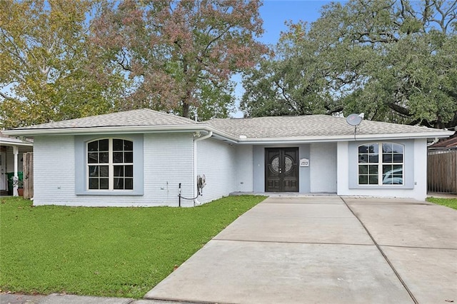 1713 Thomas St, Gretna, LA 70053 - single story home featuring driveway, a shingled roof, and brick siding