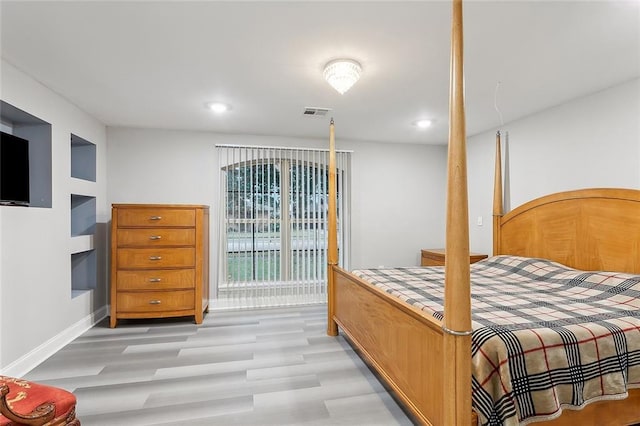 1713 Thomas St, Gretna, LA 70053 - bedroom with light wood-style floors and recessed lighting