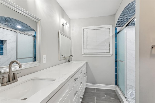 1713 Thomas St, Gretna, LA 70053 - bathroom featuring a stall shower, double vanity, and tile patterned floors