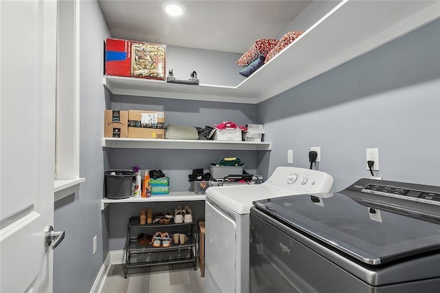 1713 Thomas St, Gretna, LA 70053 - washroom with washing machine and dryer and wood finished floors