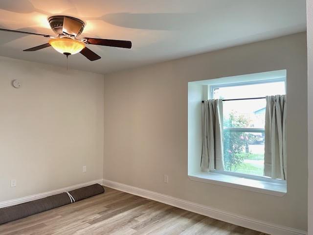 2120 Killington Dr, Harvey, LA 70058 - empty room featuring baseboards, light wood-style floors, and ceiling fan