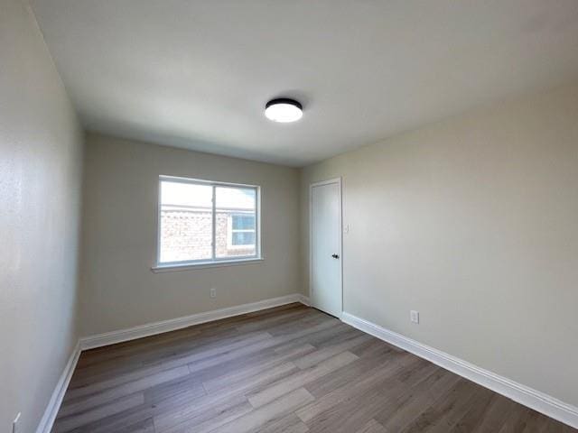 2120 Killington Dr, Harvey, LA 70058 - empty room featuring wood finished floors and baseboards