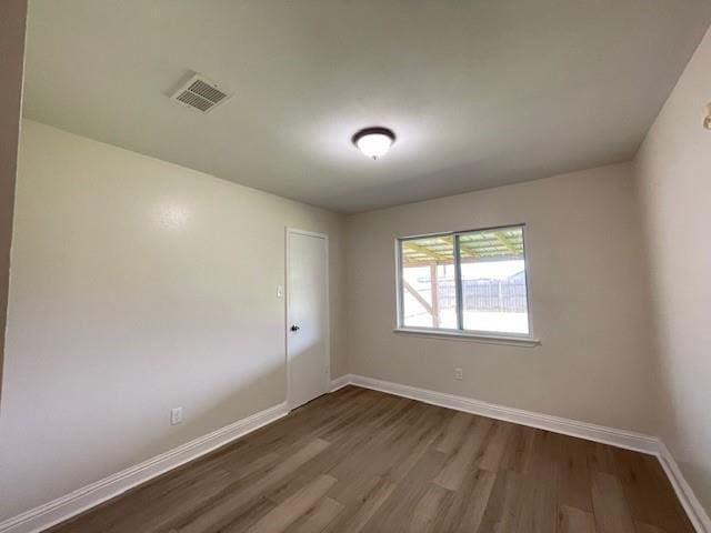 2120 Killington Dr, Harvey, LA 70058 - unfurnished room with dark wood-type flooring and baseboards