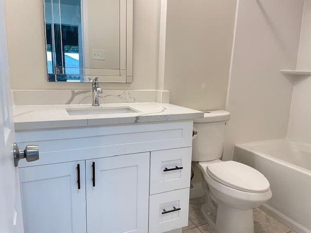 2120 Killington Dr, Harvey, LA 70058 - full bathroom with vanity, toilet, and tile patterned floors