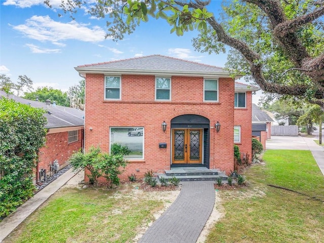 231 Audubon Blvd, New Orleans, LA 70125 - view of front of property with a front lawn and brick siding