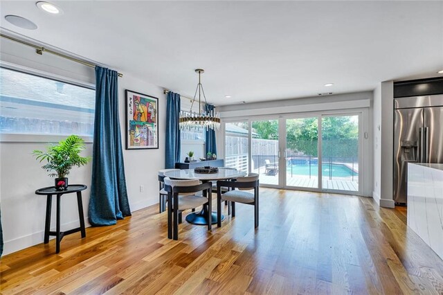 231 Audubon Blvd, New Orleans, LA 70125 - dining space featuring light wood-style flooring, baseboards, and recessed lighting