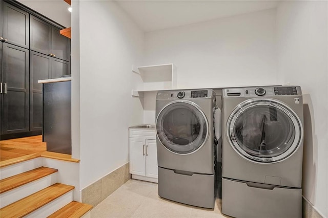 231 Audubon Blvd, New Orleans, LA 70125 - washroom with separate washer and dryer and cabinet space
