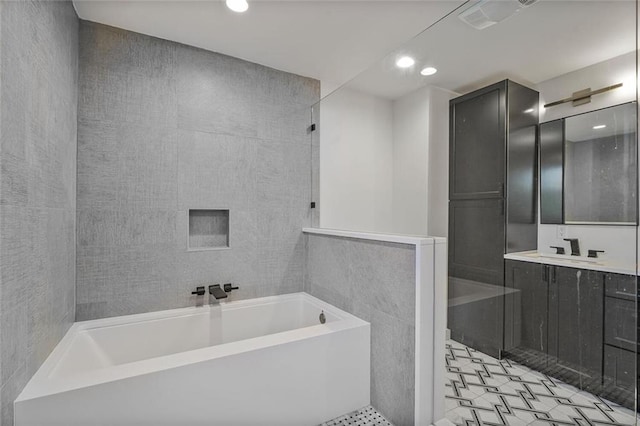 231 Audubon Blvd, New Orleans, LA 70125 - full bath with a garden tub, recessed lighting, and vanity