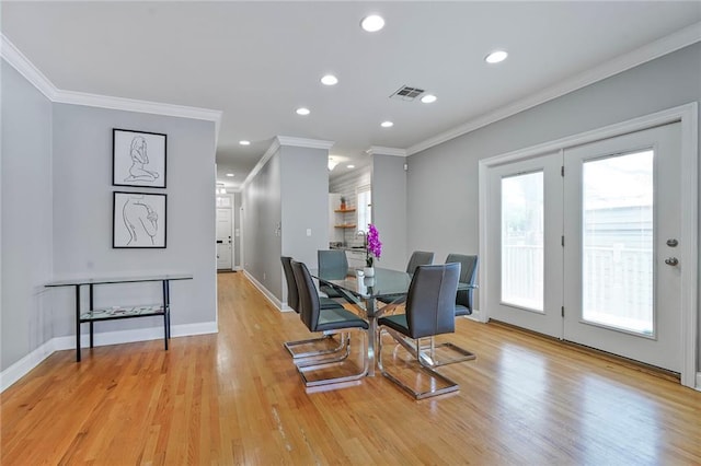 231 Audubon Blvd, New Orleans, LA 70125 - dining area featuring ornamental molding, recessed lighting, and light wood-style floors
