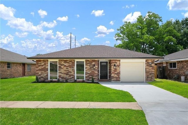 30 Normandy Dr, Kenner, LA 70065 - single story home featuring concrete driveway, a front lawn, a garage, and brick siding