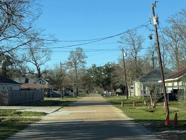 506 S Olive St, Hammond, LA 70403 - view of asphalt road featuring street lights and a residential view
