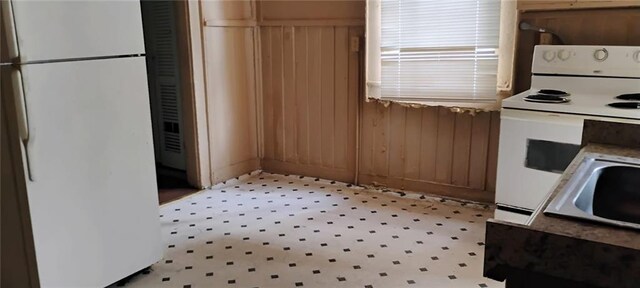 182224 Frenchmen St, New Orleans, LA 70116 - kitchen featuring white appliances and a sink