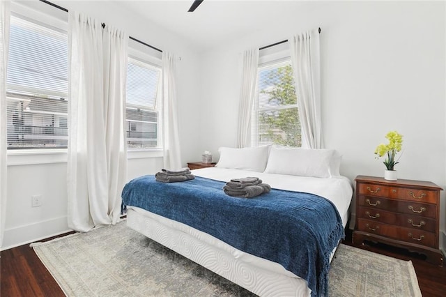 3429 Willow St, New Orleans, LA 70115 - bedroom featuring wood finished floors, baseboards, and a ceiling fan