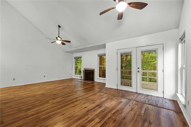 42 E Chamale Cv Unit 42, Slidell, LA 70460 - unfurnished living room featuring ceiling fan, french doors, wood finished floors, high vaulted ceiling, and baseboards