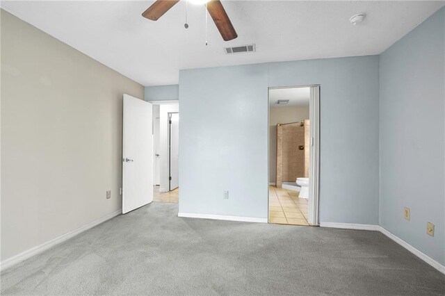 42 E Chamale Cv Unit 42, Slidell, LA 70460 - unfurnished bedroom featuring carpet flooring, baseboards, ensuite bath, and a ceiling fan