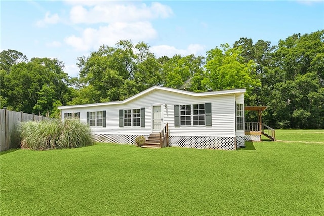 12175 Reid Rd, Amite, LA 70422 - rear view of house with view of wooded area