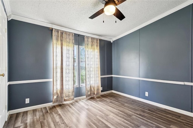 12175 Reid Rd, Amite, LA 70422 - empty room featuring ornamental molding, a textured ceiling, a ceiling fan, wood finished floors, and baseboards