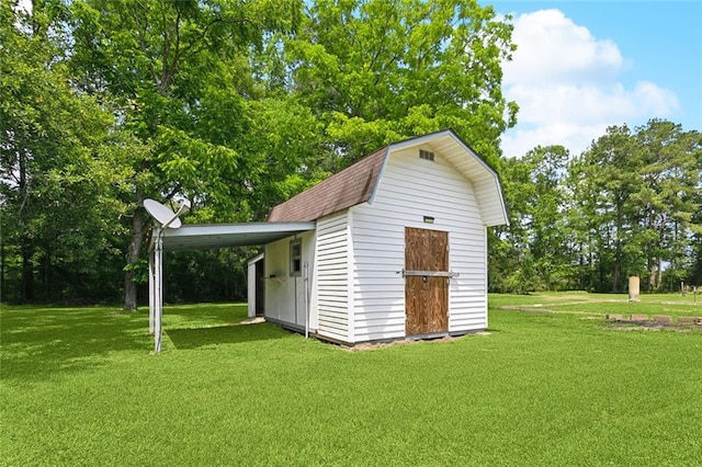 12175 Reid Rd, Amite, LA 70422 - view of shed with a carport and view of scattered trees