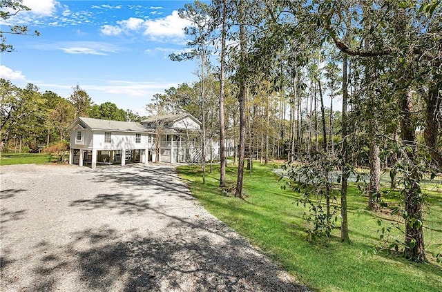 59314 Cypress Bayou Ln, Lacombe, LA 70445 - view of front of house featuring a front yard