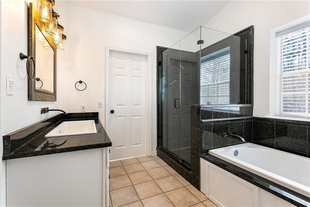 59314 Cypress Bayou Ln, Lacombe, LA 70445 - bathroom featuring a garden tub, vanity, a shower stall, and plenty of natural light