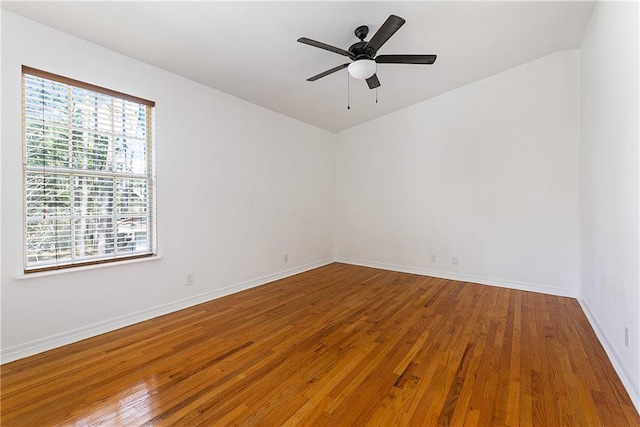 59314 Cypress Bayou Ln, Lacombe, LA 70445 - unfurnished room with hardwood / wood-style flooring, plenty of natural light, and baseboards