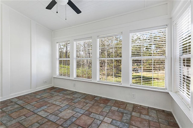 59314 Cypress Bayou Ln, Lacombe, LA 70445 - unfurnished sunroom featuring baseboards and brick patterned flooring