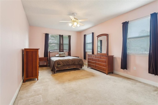 1124 Indigo Ct, Slidell, LA 70460 - bedroom with carpet flooring, baseboards, and ceiling fan