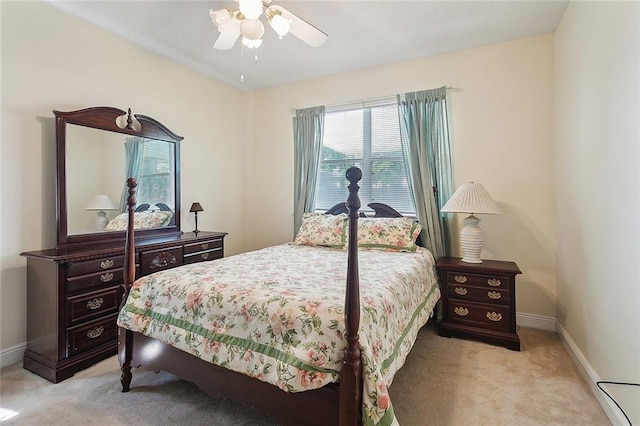 1124 Indigo Ct, Slidell, LA 70460 - bedroom with light carpet, baseboards, and a ceiling fan