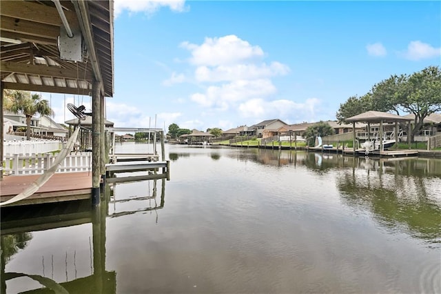 127 Windward Passage St, Slidell, LA 70458 - dock with boat lift, a water view, and a residential view