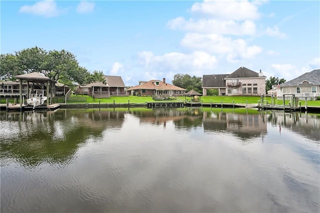 127 Windward Passage St, Slidell, LA 70458 - water view featuring nearby suburban area and a boat dock