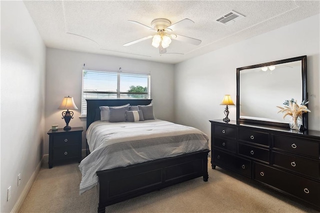 127 Windward Passage St, Slidell, LA 70458 - bedroom featuring light carpet, a textured ceiling, baseboards, and ceiling fan