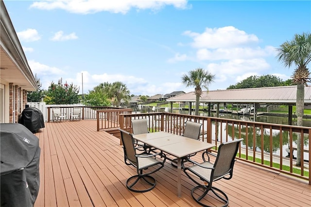 127 Windward Passage St, Slidell, LA 70458 - wooden deck featuring grilling area, a water view, and outdoor dining area
