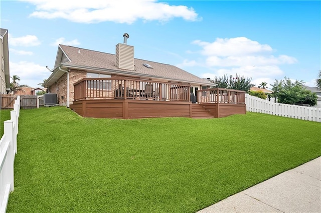 127 Windward Passage St, Slidell, LA 70458 - back of house with brick siding, a deck, central air condition unit, and roof with shingles