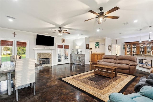 39602 E Tiger Loop, Ponchatoula, LA 70454 - living room with french doors, ceiling fan, ornamental molding, recessed lighting, and baseboards