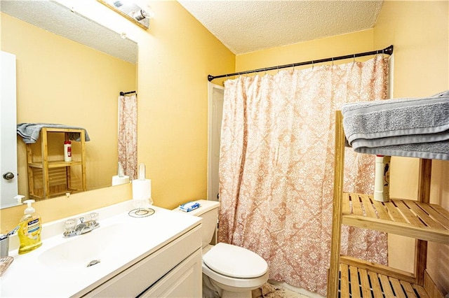 2404 Timbers Dr, Harvey, LA 70058 - full bath featuring vanity, toilet, a textured ceiling, and curtained shower