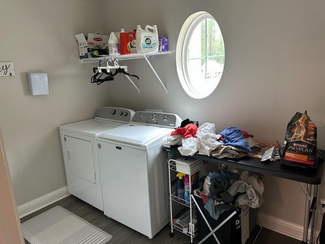 42155 Pasqua Rd, Ponchatoula, LA 70454 - laundry room with washing machine and dryer, dark wood-style floors, and baseboards