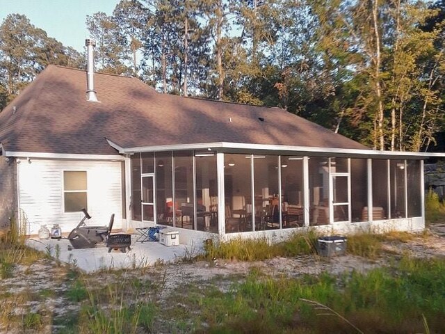 42155 Pasqua Rd, Ponchatoula, LA 70454 - back of house featuring a sunroom